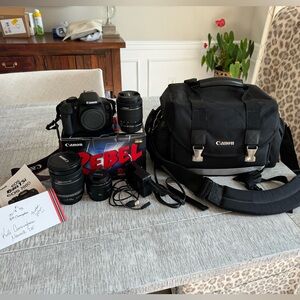 Canon Rebel T5i DSLR kit with 3 lenses and 2 cases.